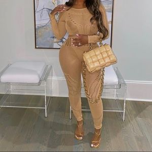 Nude jumpsuit. Never worn. Brand new.